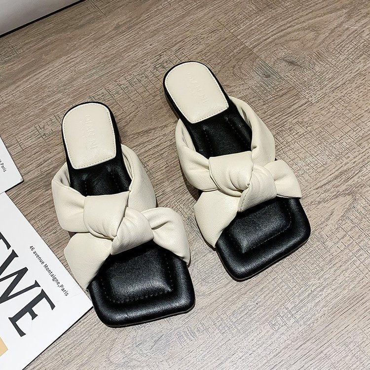 Fashion twisted slippers