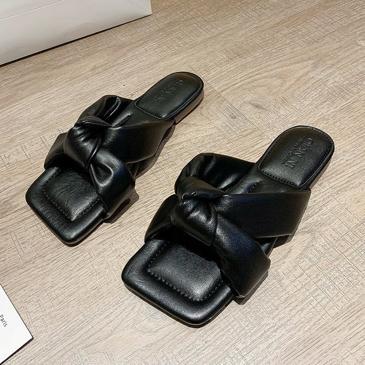 Fashion twisted slippers