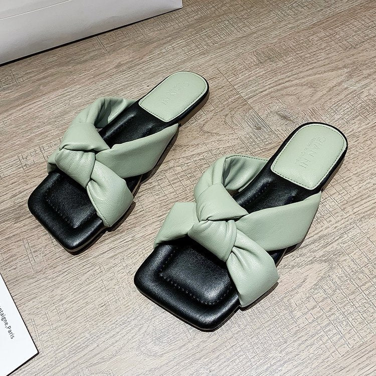 Fashion twisted slippers