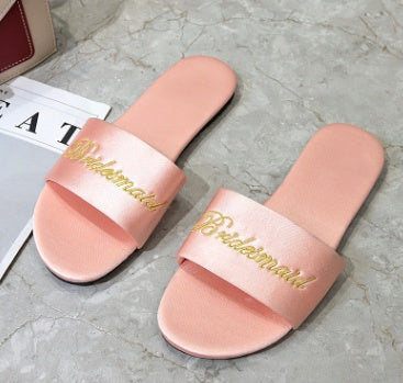 Satin red slippers